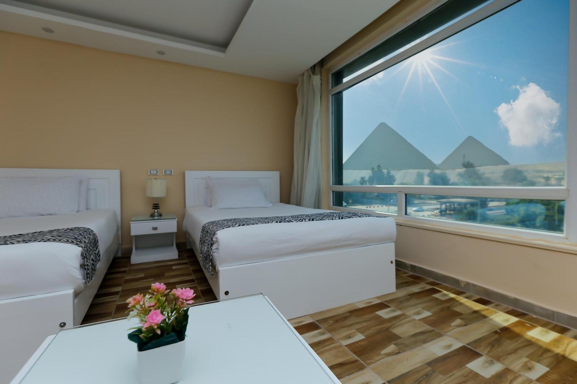 Turquoise Pyramids & Grand Egyptian Museum View Hotel Kafrat al Jabal ภายนอก รูปภาพ